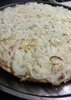 Una foto de Fugazza doble queso, rellena de bondiola