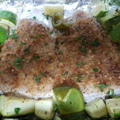 A picture of Nile fish fillet with bread crumbs.