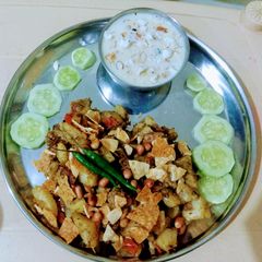 A picture of Makhana kheer with dhaniya Aloo moongfali chaat.