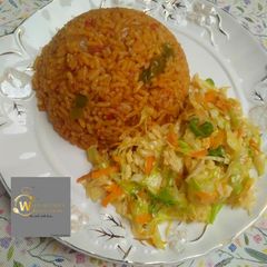 Jollof Rice with Salad A picture of Jollof Rice with Salad.