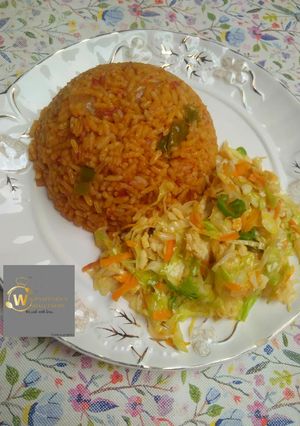 A picture of Jollof Rice with Salad.