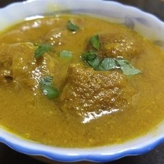 A picture of Moong Dal Dumplings In Gravy.