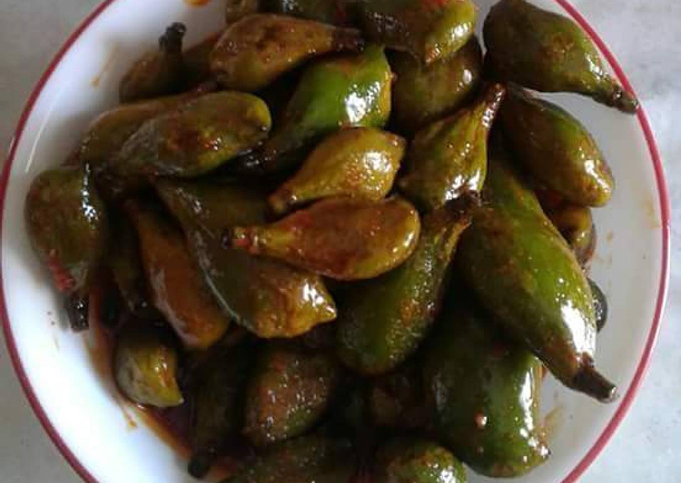Raw baby mango pickle