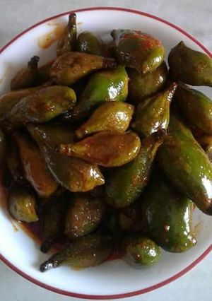 A picture of Raw baby mango pickle.