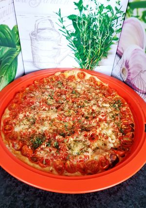 Une photo de Tarte fine à la tomate moutarde