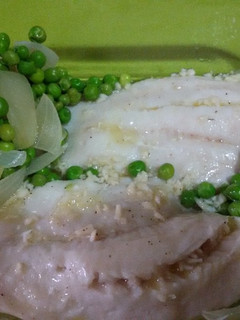 Una foto de Merluza con emulsión de limón con thermomix