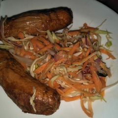A picture of Cabbage salad with sausage.
