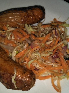 A picture of Cabbage salad with sausage.