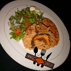 Jollof Rice & Beans, wif salad A picture of Jollof Rice & Beans, wif salad.