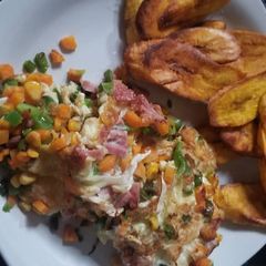 A picture of Fried plantain and fried egg.