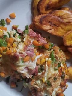 A picture of Fried plantain and fried egg.