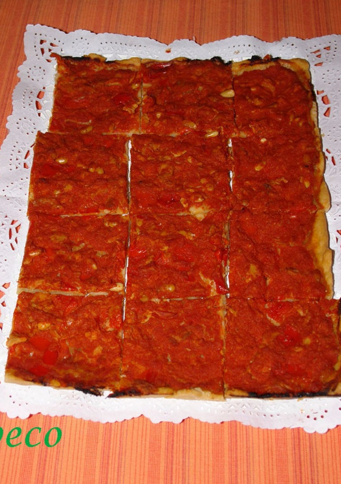 Una foto de Coca de tomate