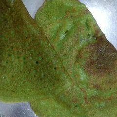 A picture of Spinach moong dal dosa.