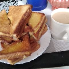 A picture of Toast with ginger tea#festivecontestnairobieast#authormarathon.