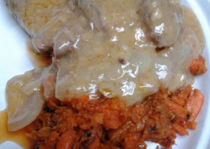 Butter gravy smothered sirloin with mashed carrots