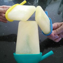A picture of Fizzy Orange Ice lollies.
