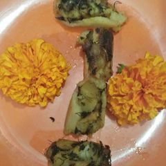 A picture of Lotus stem Stuffed with aalu methi.