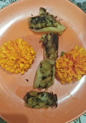 A picture of Lotus stem Stuffed with aalu methi.