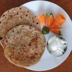 A picture of Raw papaya and flaxseed paratha.