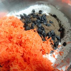 A picture of Eggless Carrot and raisin cake.