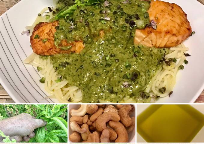 Grilled salmon with pesto on top of pasta