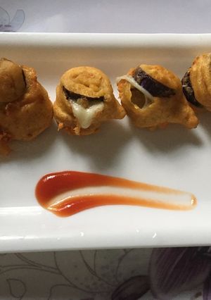 A picture of Baingan cheese pakoda.