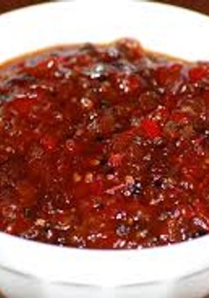 A picture of Tomato and anar danay Ki chatni.