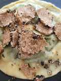 Raviolo "San Domenico" con tuorlo fondente e tartufo nero estivo