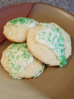 A picture of Lemon Ricotta Cookies w/ Lemon Glaze.