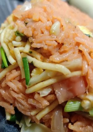 A picture of Tripple Fried Schezwan Rice With Noodels.