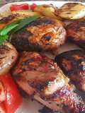 Muslos de pollo y papas asadas