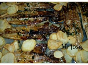 Una foto de Sarda horneada con patatas