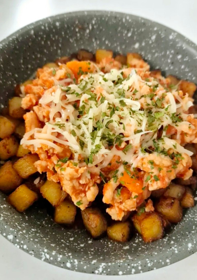 Una foto de Patatas boloñesa
