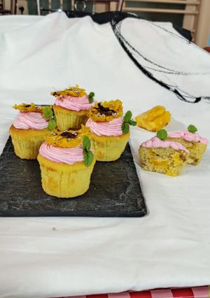 A picture of Jackfruit muffins with strawberry icing.