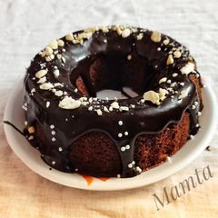 A picture of Bourbon Biscuiti Bundt Cake (with homemade chocolate sauce).