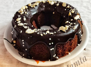 A picture of Bourbon Biscuiti Bundt Cake (with homemade chocolate sauce).