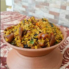 A picture of Native jollof rice@zahra's cuisine.