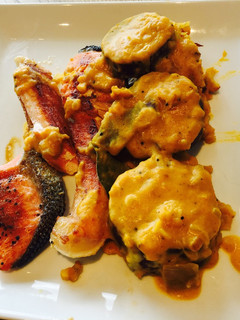 A picture of Pumpkin creamy sauce on sweet potato.