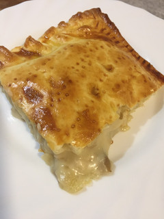 Una foto de Empanada de pollo y setas