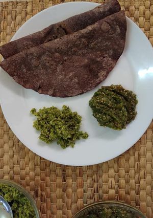 A picture of Ragi Rotti with Roasted Brinjal Chutney and Coconut Chutney.