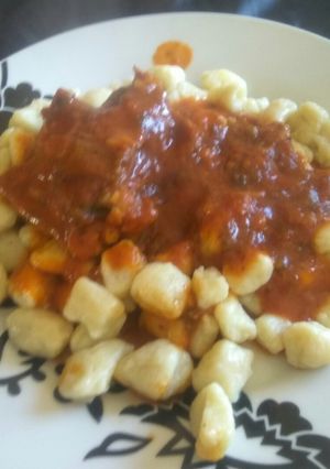 Una foto de Ñoquis caseros con salsa