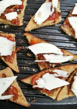 A picture of Spicy Cheesy Jaggery Toast.