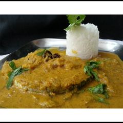 A picture of Goan Fish/Egg Curry.