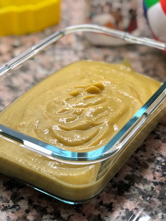 Una foto de Puré para bebés de pollo maíz, puerro, judías verdes y boniato
