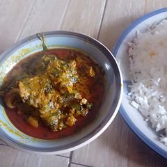 Banga stew with white rice A picture of Banga stew with white rice.