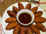 মুগ ডালের ভাজা পুলি পিঠে (Moong daler Bhaja Puli Pithe recipe in b