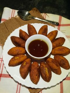 মুগ ডালের ভাজা পুলি পিঠে (Moong daler Bhaja Puli Pithe recipe in b রেসিপির প্রধান ছবি