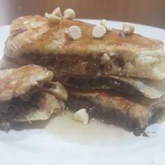 Una foto de Hot cakes rellenas de nutella