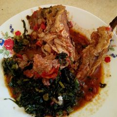 A picture of Obambla stewed with greens.