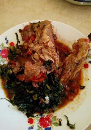 A picture of Obambla stewed with greens.